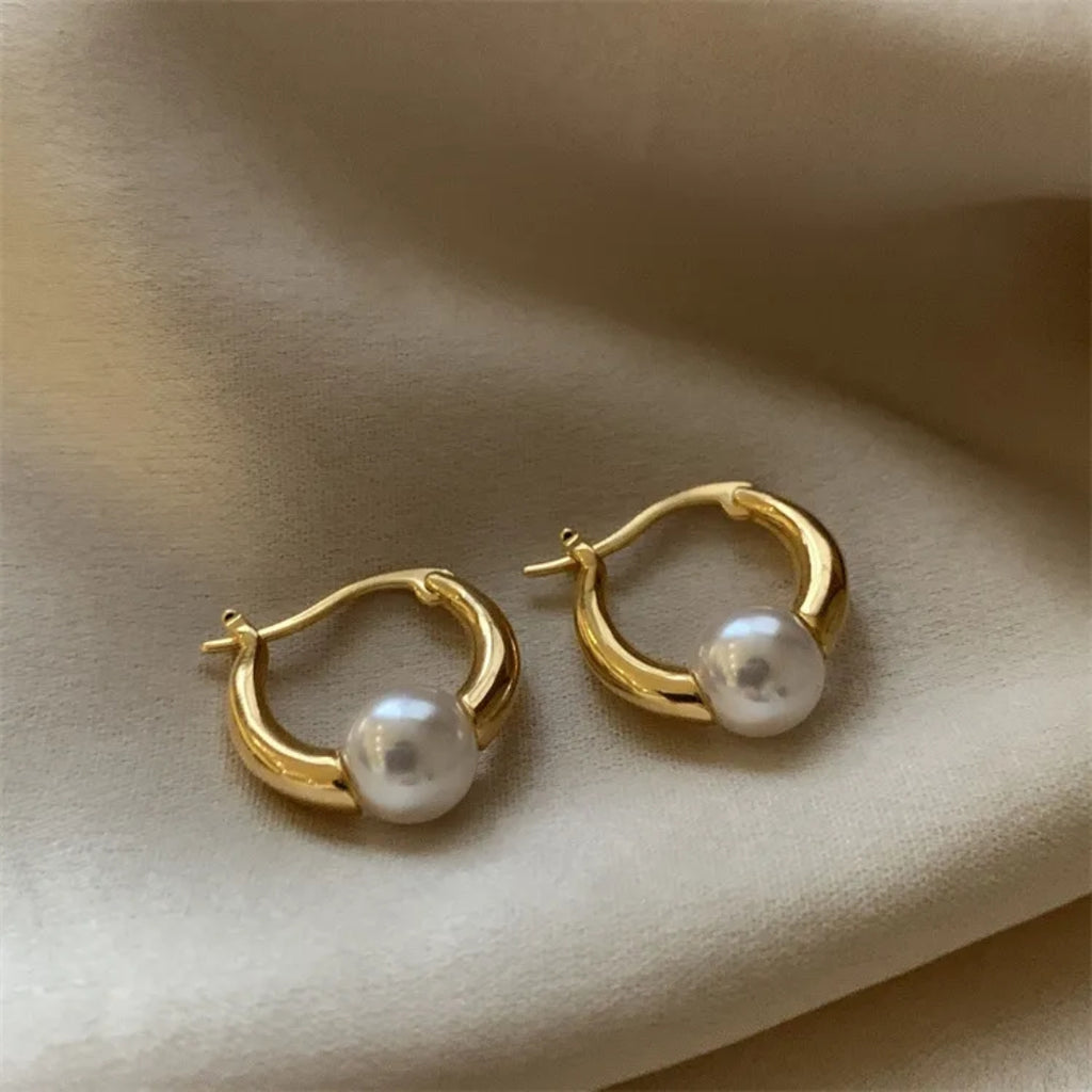 Boucles d'oreilles élégantes avec perles en or