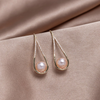 Boucles d'oreilles en perles d'or rose