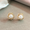 Boucles d'oreilles élégantes avec perles en spirale en zirconium doré