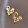 Boucles d'oreilles élégantes en forme de cœur en or